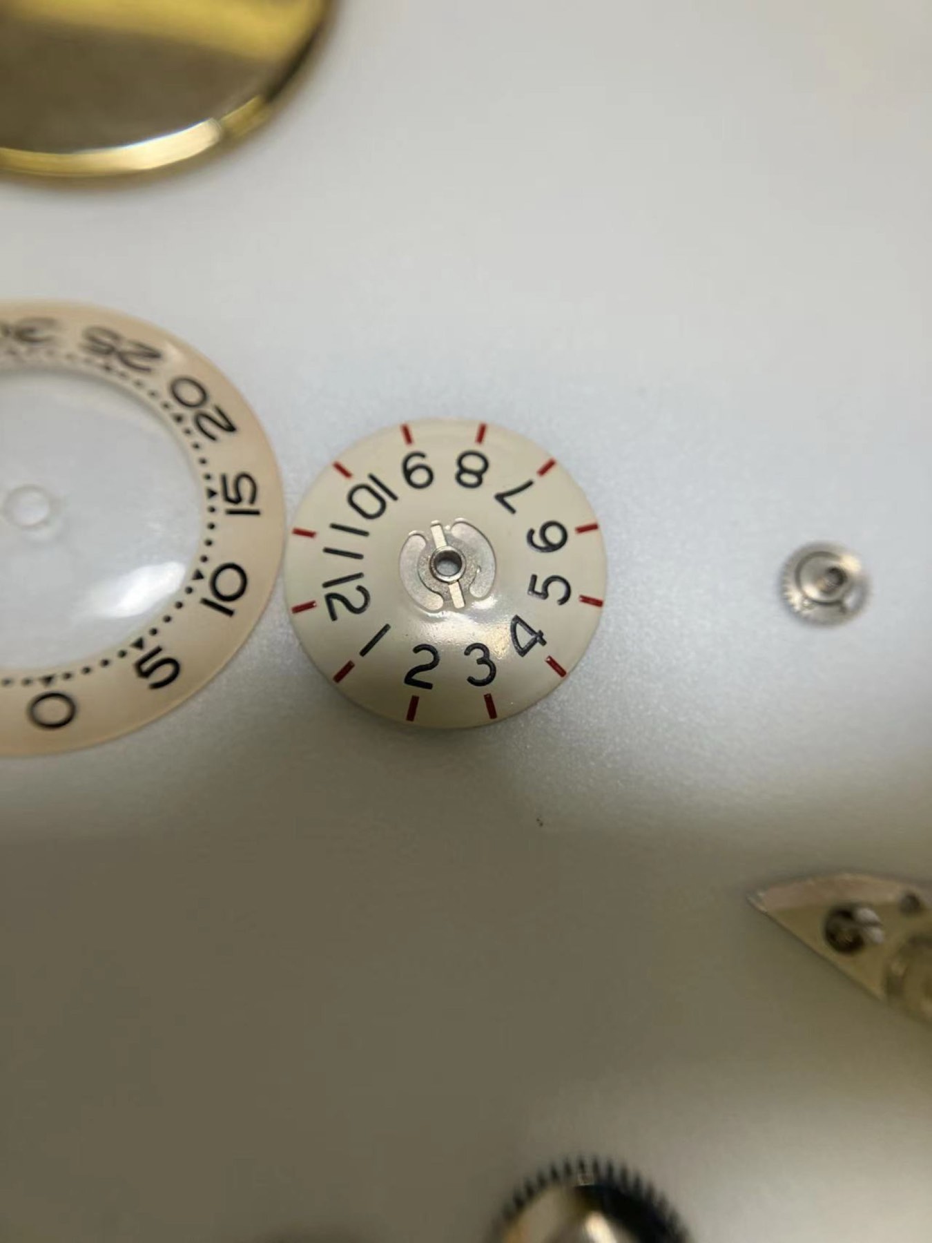 Close view of the Grade 719 hour and minute discs