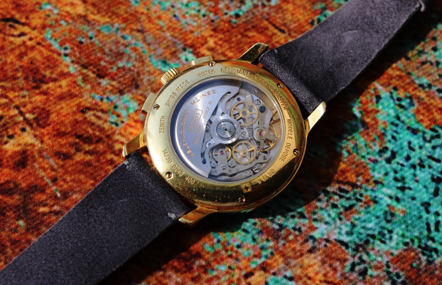 El Primero calibre 400 seen through the sapphire caseback of the gold Chronomaster